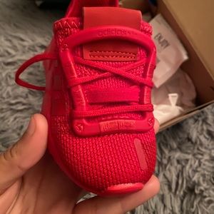 Red Adidas baby sneakers